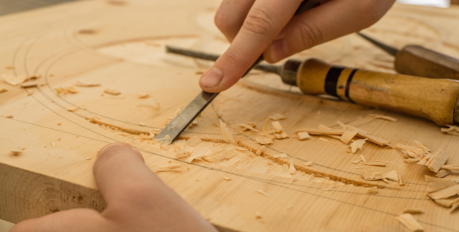 Placeholder — hands working wood